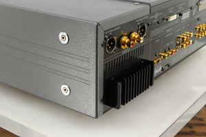 Rear right corner of a used Esoteric DV-50s DVD Player in a silver finish