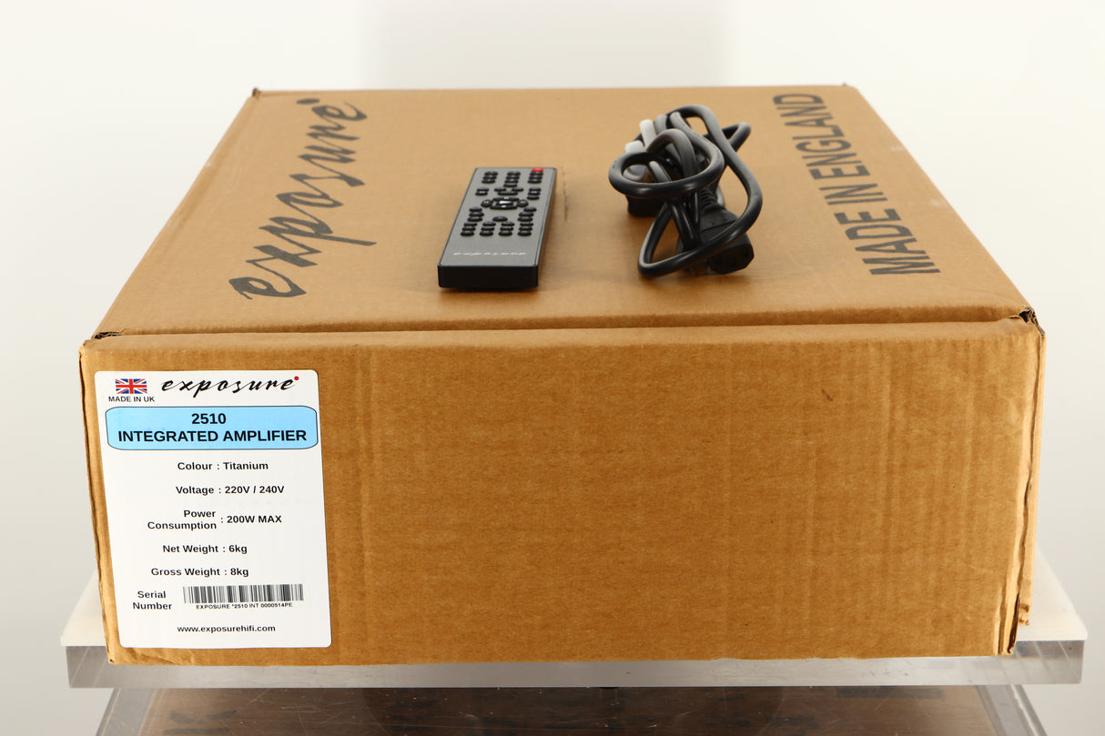 Box of a used Exposure 2510 Integrated Amplifier in Titanium finish with mains cable, and remote 