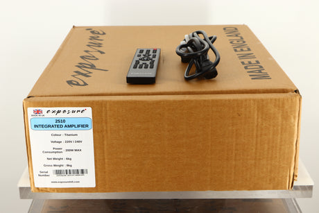 Box of a used Exposure 2510 Integrated Amplifier in Titanium finish with mains cable, and remote 
