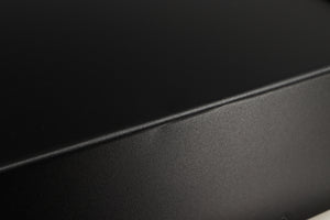 Close up of a used Exposure 3510 Integrated Amplifier in a black finish showing 2 small indents