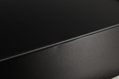 Close up of a used Exposure 3510 Integrated Amplifier in a black finish showing 2 small indents