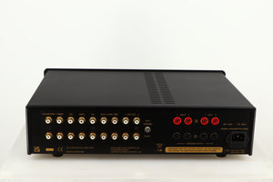 Rear view of a used Exposure 3510 Integrated Amplifier in a black finish showing Phono Inputs, Speaker Outputs and Mains Input