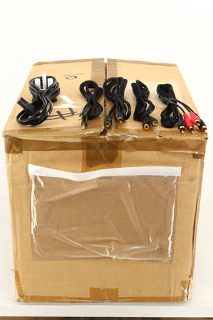 Box of a used pair of Focal XS Book Wireless 2.0 Active Bluetooth Standmount Speakers showing Mains Cable, 3.5mm Cable, M-M RCA Cable, M-F RCA Cable, and Interconnects 
