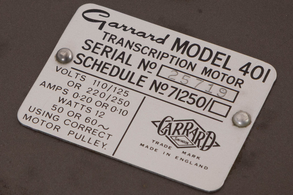 Close up of a used Garrard 401 Turntable Motor Unit showing serial number