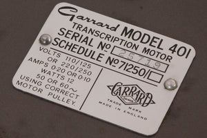 Close up of a used Garrard 401 Turntable Motor Unit showing serial number