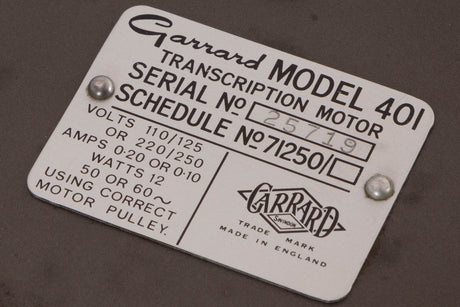 Close up of a used Garrard 401 Turntable Motor Unit showing serial number