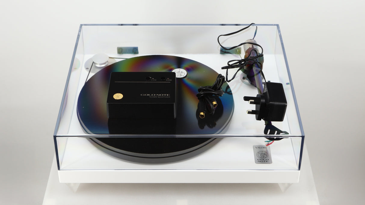 Top of a used Gold Note Valore 425 Plus Turntable W/ Tonearm in a white finish showing Speed Control, PSU and DIN Cable 