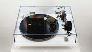 Top of a used Gold Note Valore 425 Plus Turntable W/ Tonearm in a white finish showing Speed Control, PSU and DIN Cable 