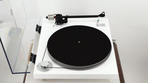 Left side view of a used Gold Note Valore 425 Plus Turntable W/ Tonearm in a white finish