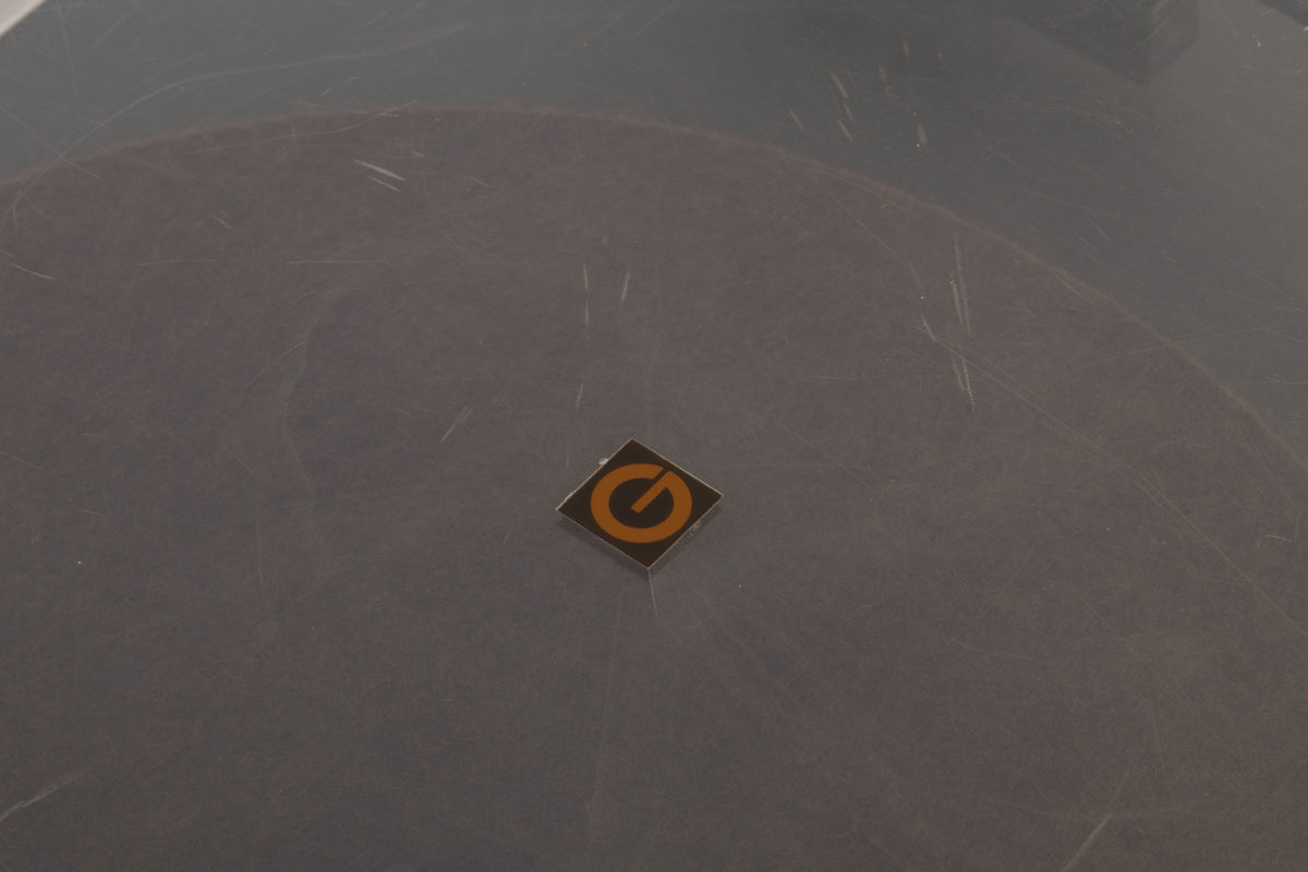 Close up of a used Goldring GR1.2 Turntable showing scratching on lid