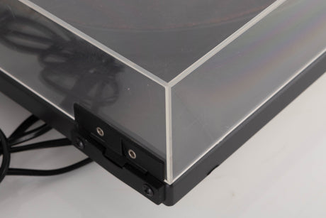 Rear left corner of a used Goldring GR1.2 Turntable W/ Linn Basik Cartridge in a Black finish