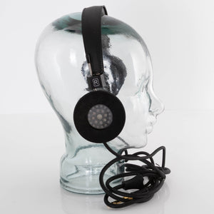 Left side of used Grado SR225X Headphones in a Black finish showing inside of right earmuff