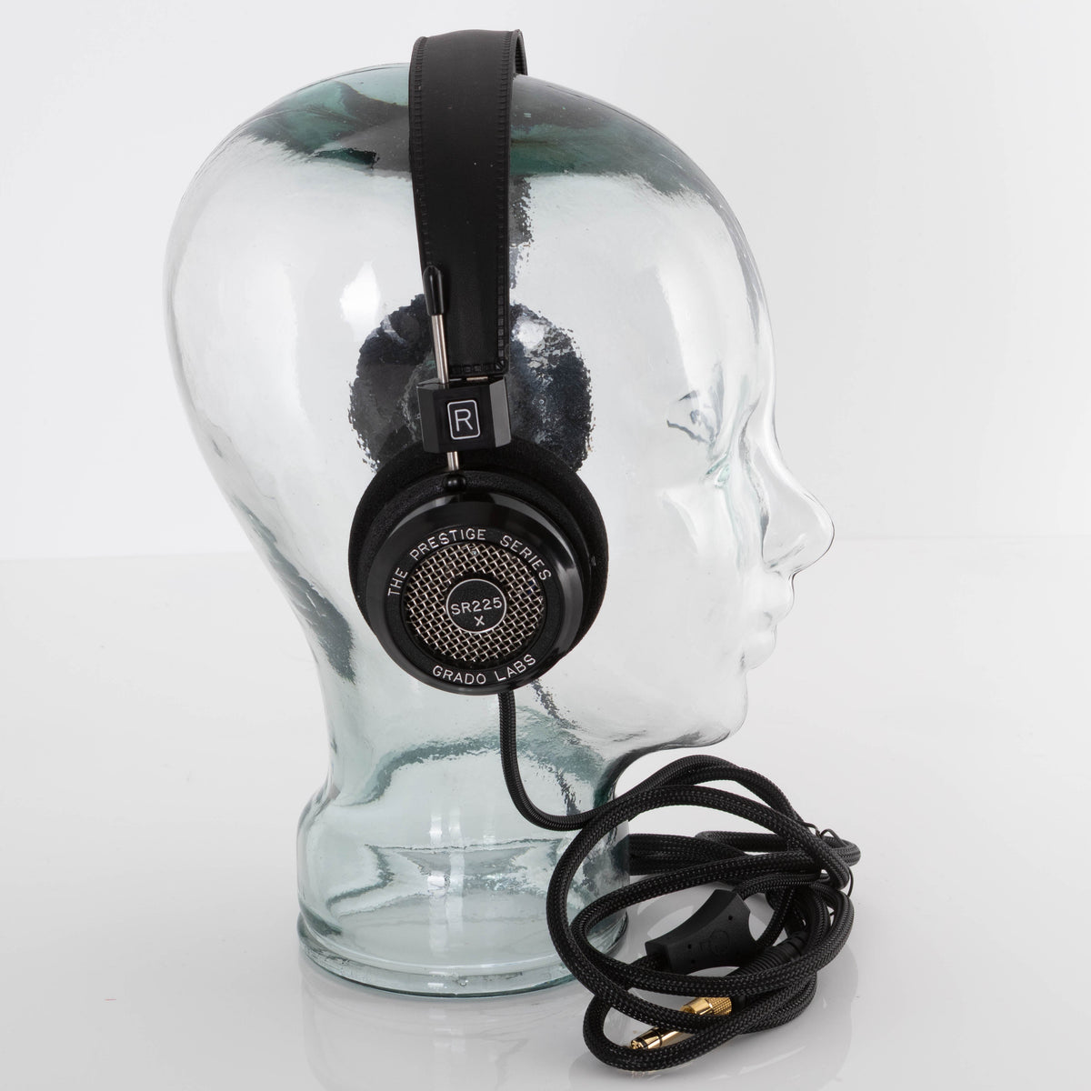Left side view of used Grado SR225X Headphones in a Black finish