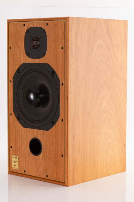 Front right corner of a used Harbeth Compact 7ES 3 Standmount Speaker in a Cherry finish