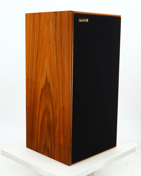 Front left corner of a used Harbeth Super HL5 Plus 40th Anniversary Standmount Speaker in a walnut finish