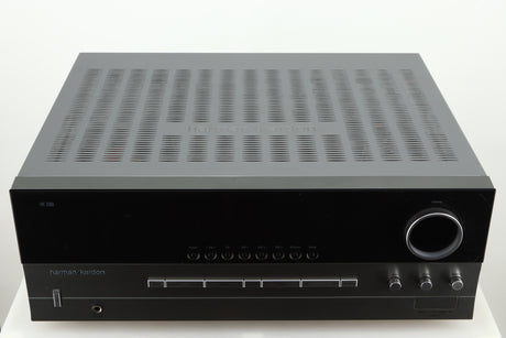 Top of a used Harman Kardon 3380 Receiver in a silver finish
