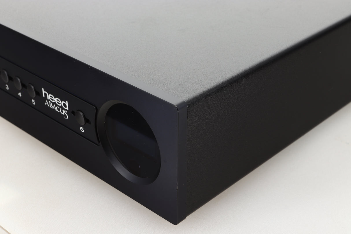 Front right corner view of a used Heed Abacus DAC in Black finish