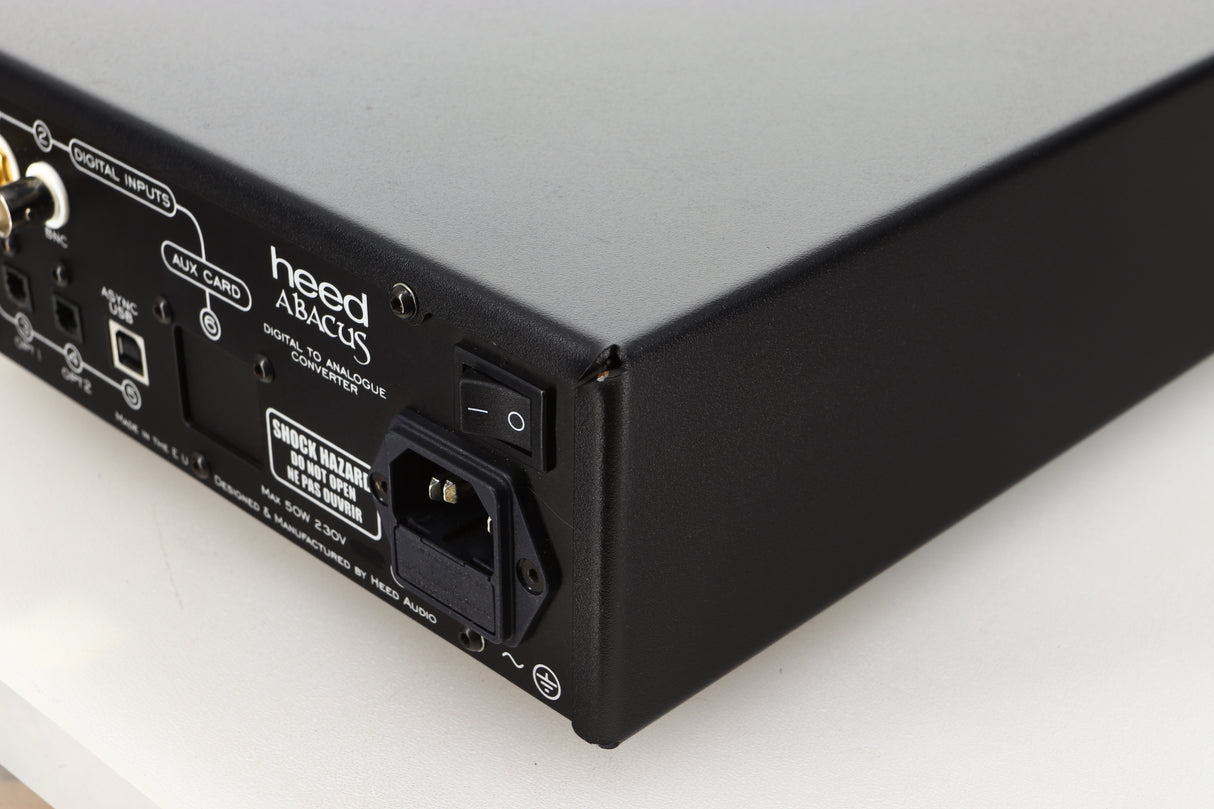 Rear right corner view of a used Heed Abacus DAC in Black finish