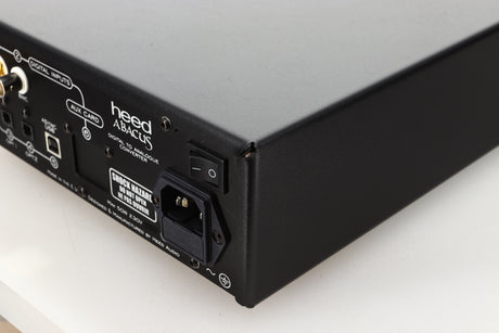 Rear right corner view of a used Heed Abacus DAC in Black finish