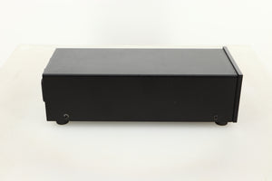Side view of a used Heed Q-PSU III Power Supply