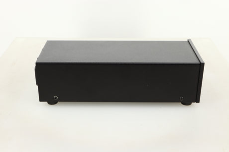 Side view of a used Heed Q-PSU III Power Supply