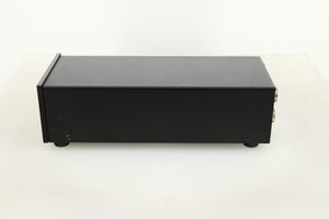 Side view of a used Heed Q-PSU III Power Supply