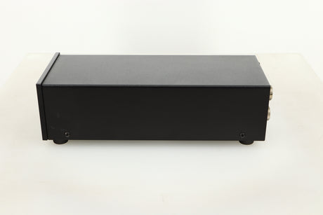 Side view of a used Heed Q-PSU III Power Supply