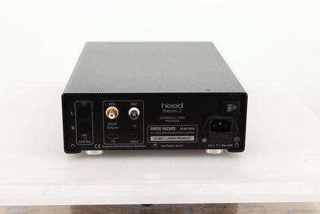 Rear view of a used Heed Thesis Delta CD Transport in Black finish showing RCA, BNC, optical, and I²S outputs, and mains input