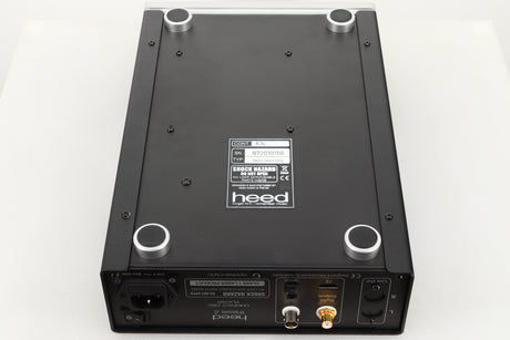 Underside view of a used Heed Thesis Delta CD Transport in Black finish