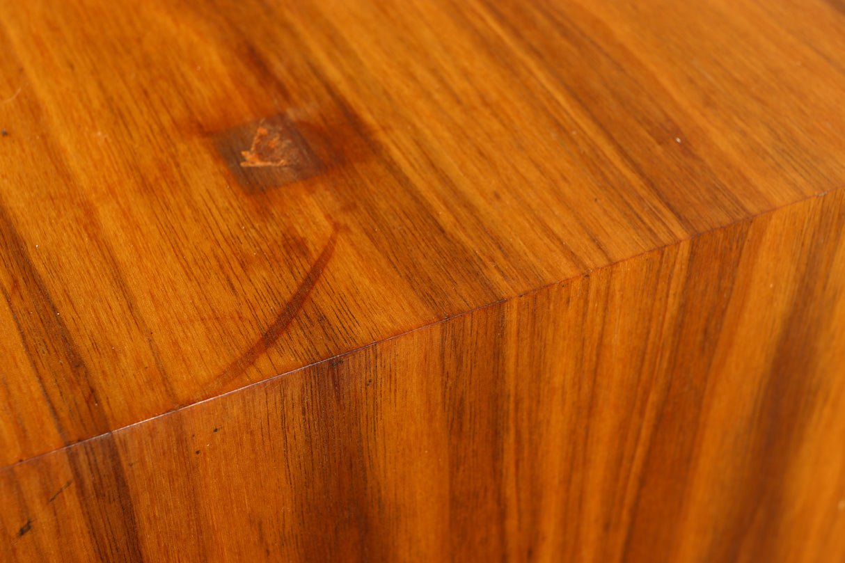 Close up of a used Heybrook HP2 Standmount Speaker in a teak finish showing some damage on top