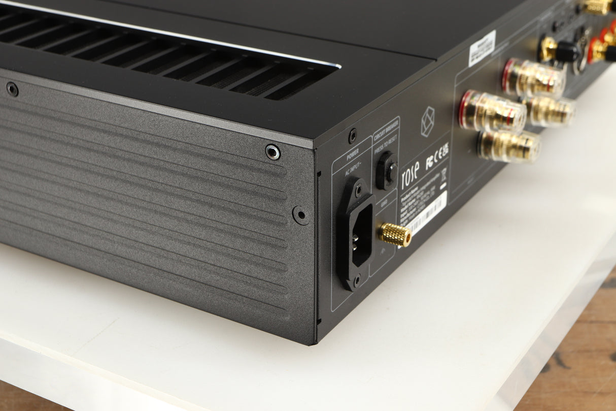 Rear right corner of a used HiFi ROSE RA280 Integrated Amplifier in a black finish