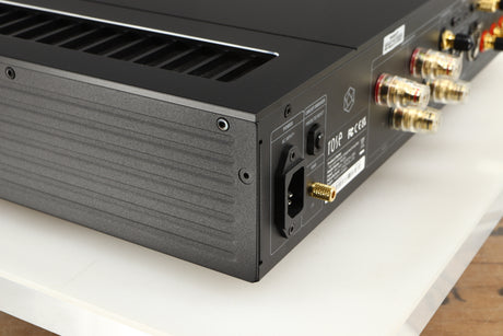 Rear right corner of a used HiFi ROSE RA280 Integrated Amplifier in a black finish