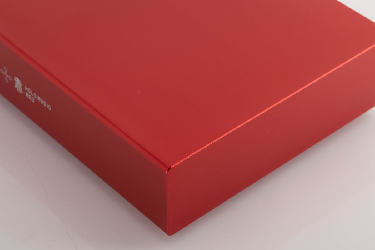 Front right corner of a used Holo Audio Red Network Streamer in a Red finish