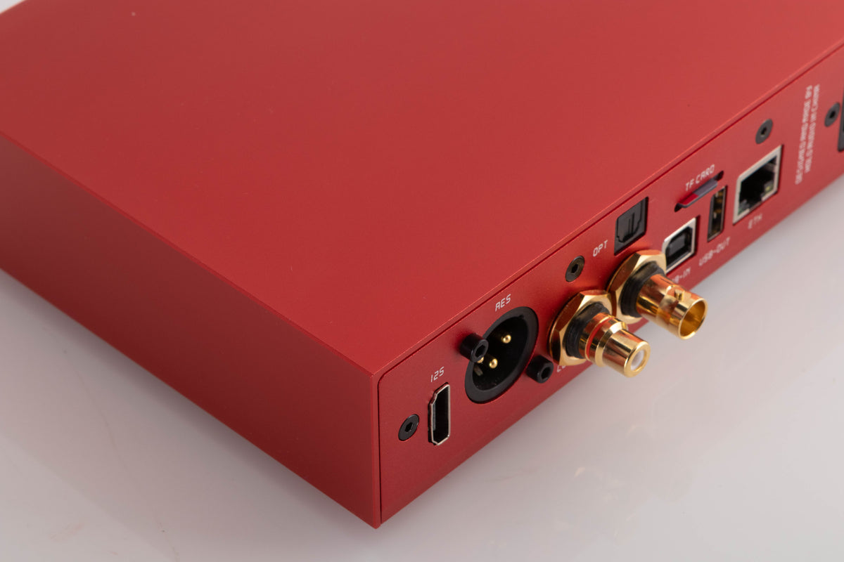 Rear right corner of a used Holo Audio Red Network Streamer in a Red finish