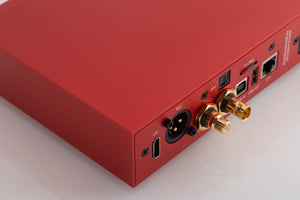 Rear right corner of a used Holo Audio Red Network Streamer in a Red finish