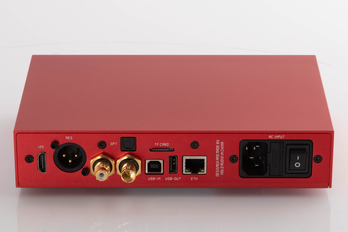 Rear view of a used Holo Audio Red Network Streamer in a Red finish showing Mains Input, Network Input, USB Input, USB Output and Optical Input
