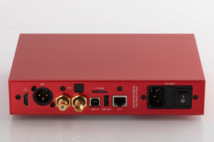 Rear view of a used Holo Audio Red Network Streamer in a Red finish showing Mains Input, Network Input, USB Input, USB Output and Optical Input