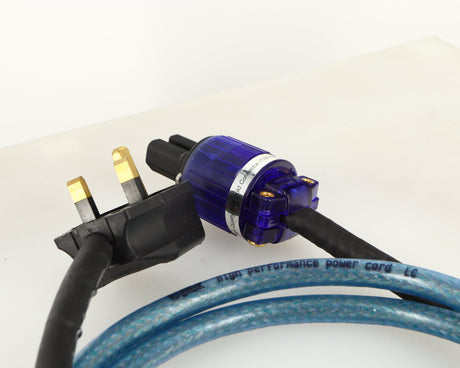 Close up of a used Isotek Elite High Performance Power Cord 1.5m showing plug and connector