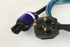 Close up of a used Isotek Elite High Performance Power Cord 1.5m showing plug and connector