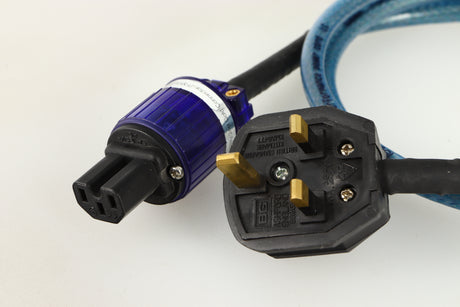 Close up of a used Isotek Elite High Performance Power Cord 1.5m showing plug and connector