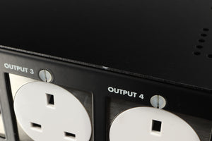 Close up of a used Isotek Nova Mains Conditioner in a black finish showing small nick on fascia