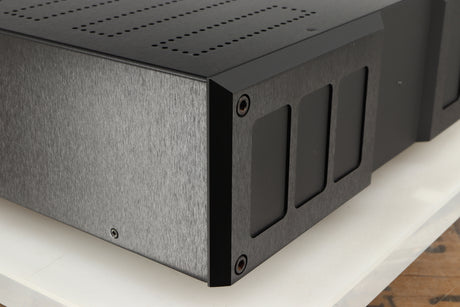 Front left corner of a used Isotek Nova Mains Conditioner in a black finish