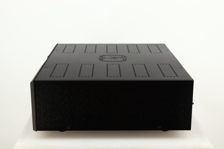 Right side view of a used Isotek Nova Mains Conditioner in a black finish