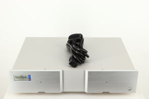 Top of a used Isotek Sigmas Gil Power Distribution in a silver finish showing Mains Cable