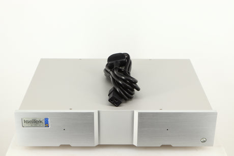Top of a used Isotek Sigmas Gil Power Distribution in a silver finish showing Mains Cable