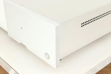Front right corner of a used Isotek Sigmas Gil Power Distribution in a silver finish