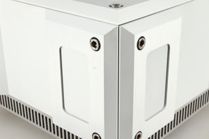 Close up of a used Isotek Titan Mains Conditioner in a silver finish showing some scratching