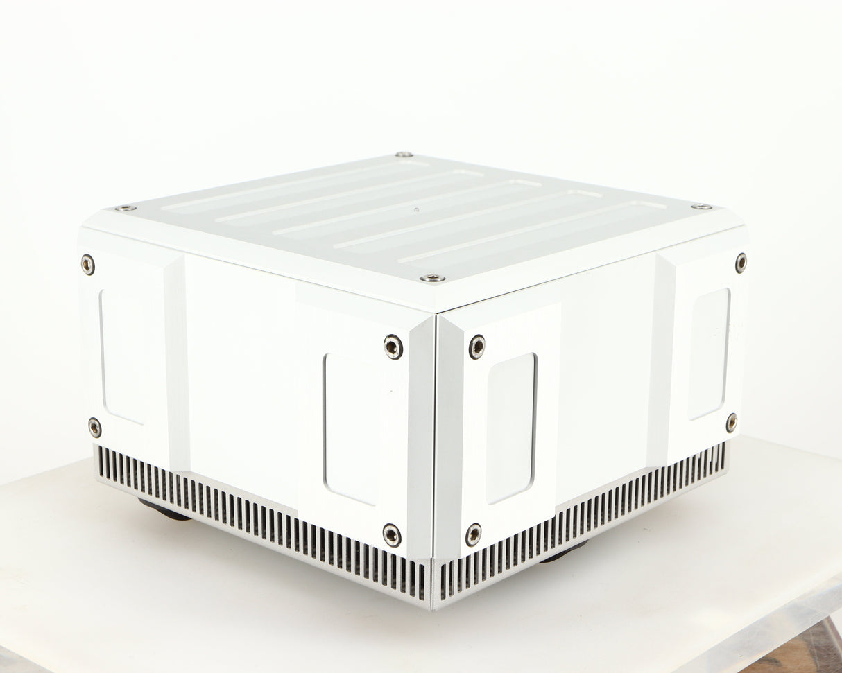 Front left corner of a used Isotek Titan Mains Conditioner in a silver finish