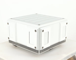 Front left corner of a used Isotek Titan Mains Conditioner in a silver finish