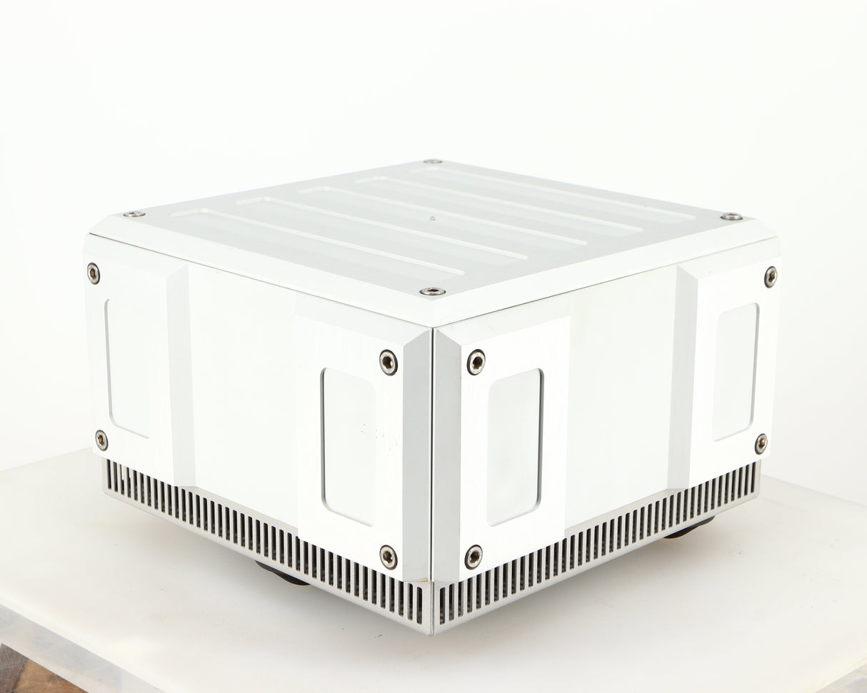 Front right corner of a used Isotek Titan Mains Conditioner in a silver finish